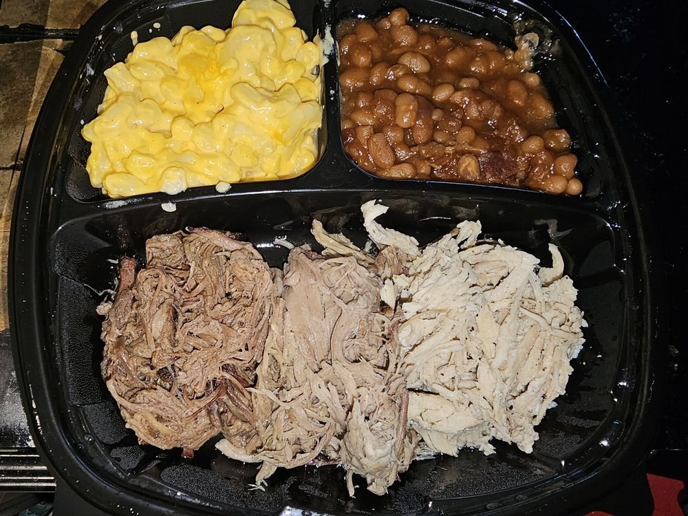 Pulled pork with macaroni and cheese and baked beans